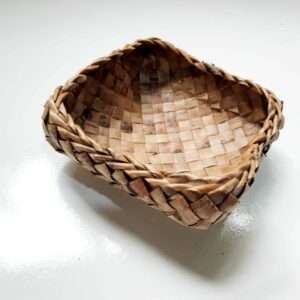 Medium coconut leaf basket, side view