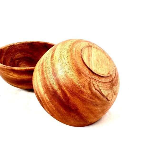 Wood Bowl which is around 6 inches in mahogany brown color