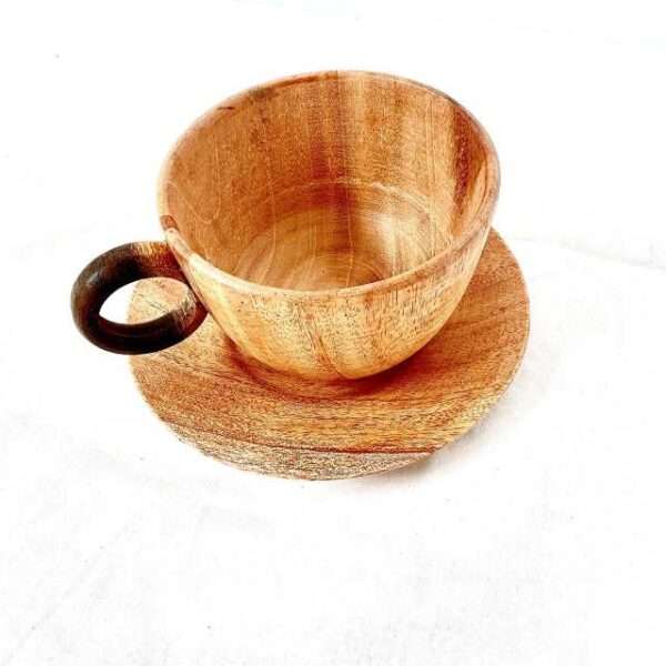 Wood tea cup and saucer , a would tea cup and a saucer in brown color