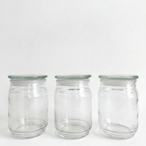 Medium glass spice jar set of 3 with airtight glass lids on a white studio background